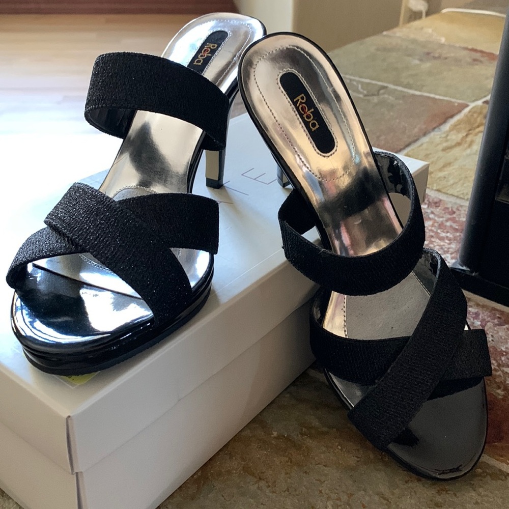 NWOT- Reba Black strapped heels.